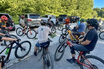 Believers on Mountain Bikes gather early in the morning to pray, recharge, & help the community.