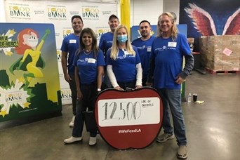 The Roque and Associates team with the help of clients helped package over 12500 pounds of potatoes!