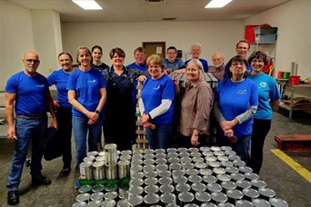 Packing food for the Rochester-area community at Channel One!