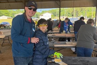 Sanding boards to help build beds, Columbia TN