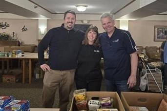 Minnesota team volunteering at Open Door Pantry