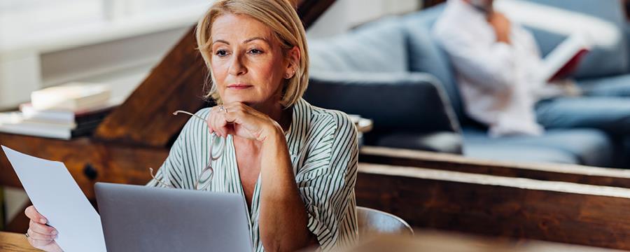 Business woman looking at paper