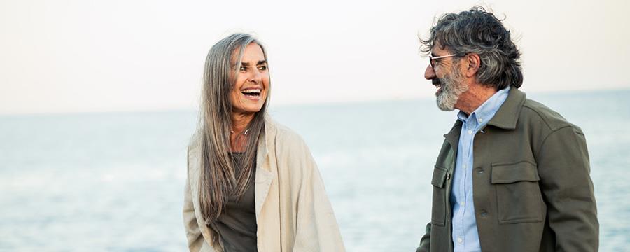 Portrait of happy couple on the beach.