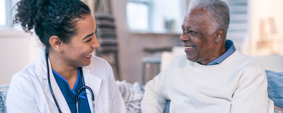 Mature patient meeting with doctor.