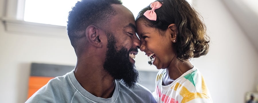 Father and daughter laughing