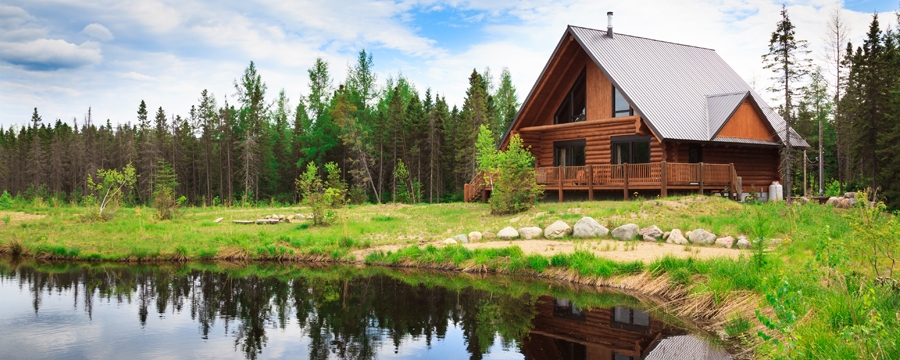 Log cabin by a lake