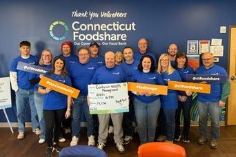 Centurion Wealth Management volunteering at CT Foodshare to fight hunger in Connecticut.