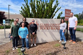 Portland and Vancouver Advisors and staff volunteering at the Clark County Food Bank.