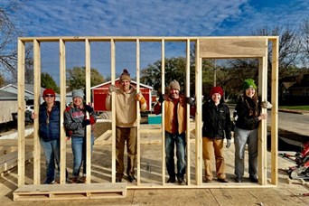 Our Team volunteering for Habitat for Humanity