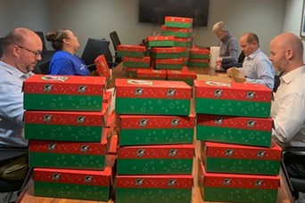 Oregon Ridge Finacial Solutions Team - Packing fifty boxes for Operation Christmas Child