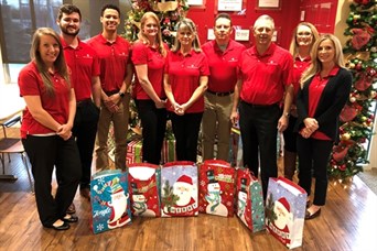 Providing gifts for the residents at Ronald McDonald House in Little Rock, Arkansas