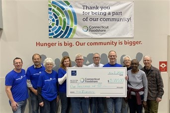 Volunteering at Foodshare where we sorted and packed 22,150 pounds of bread!